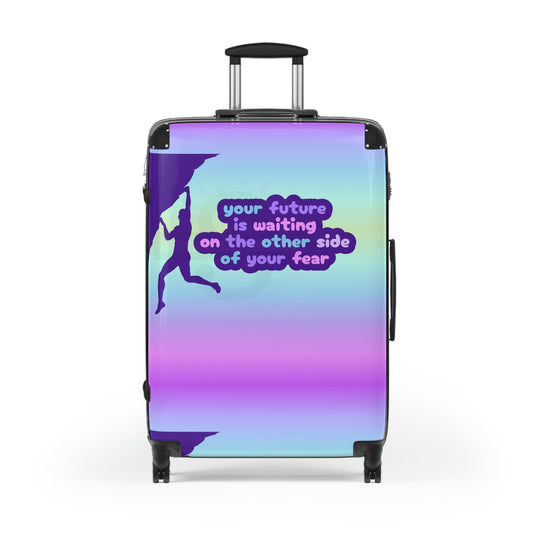 Suitcase with motivational quote "Your future is waiting on the other side of your fear"