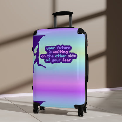 Suitcase with motivational quote "Your future is waiting on the other side of your fear"