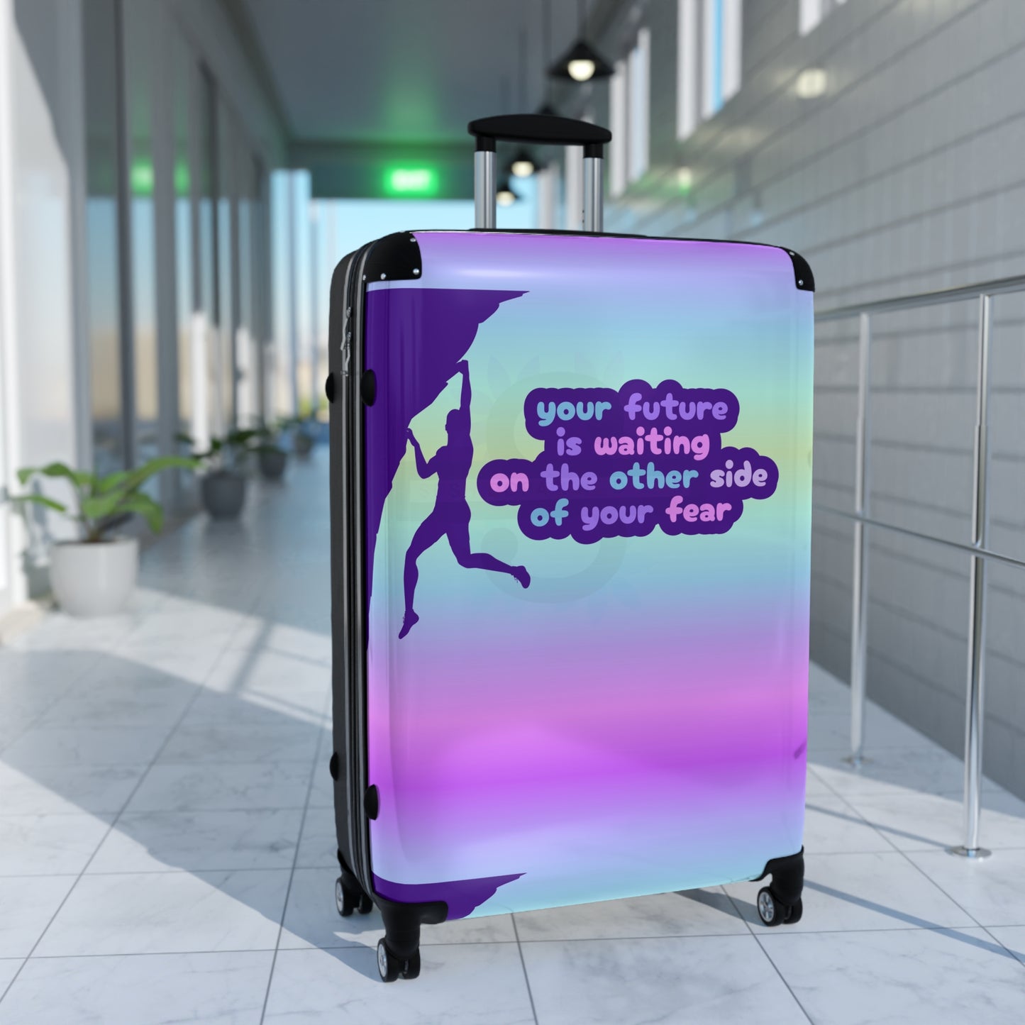 Suitcase with motivational quote "Your future is waiting on the other side of your fear"